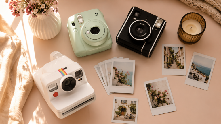 flatlay of best polaroid cameras on amazon including instax mini 12, polaroid now and instax mini evo — 2026