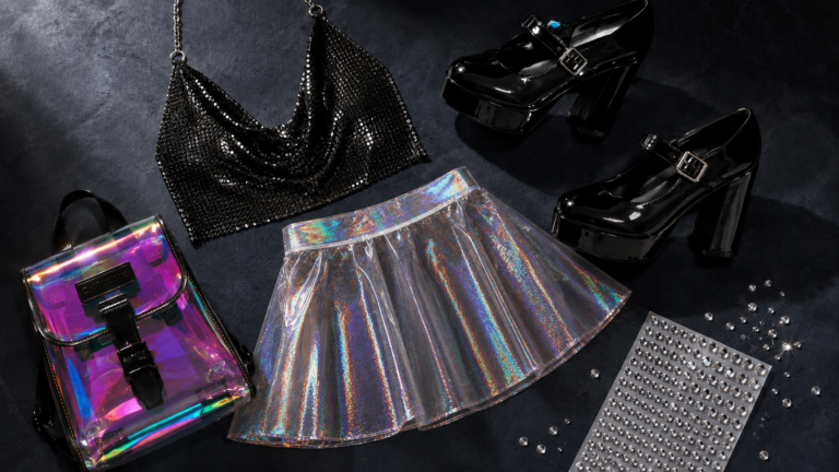 flatlay of y2k euphoria outfit pieces including sequin top, holographic skirt and face gems — y2k euphoria outfits summer 2026