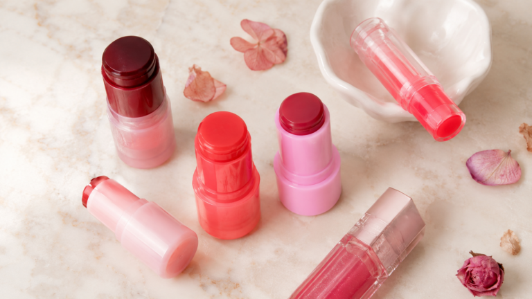 flatlay of jelly makeup products on cream surface — jelly blush and lip tint amazon finds 2026